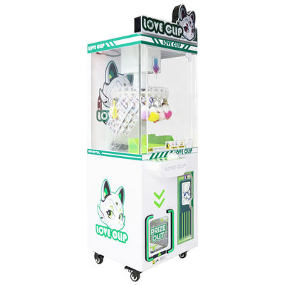 La machine à griffe de pièces de la grue verte La machine à clips de l'amour étoilé La probabilité Le prix contrôlable La machine à vendre des cadeaux